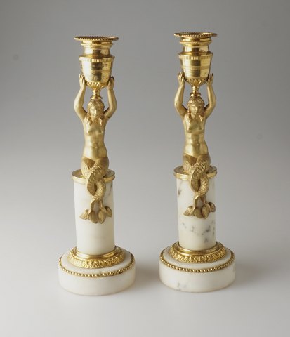 Pair of gilded candle holders with mermaids
