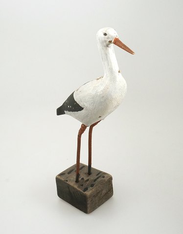Figur in Form eines Storches. Holz. H: 30cm