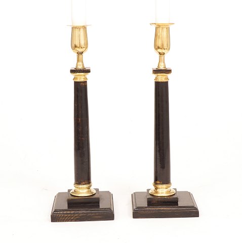 A pair of wood candelsticks with brass mountings. 
Sweden circa 1840. H: 28,5cm