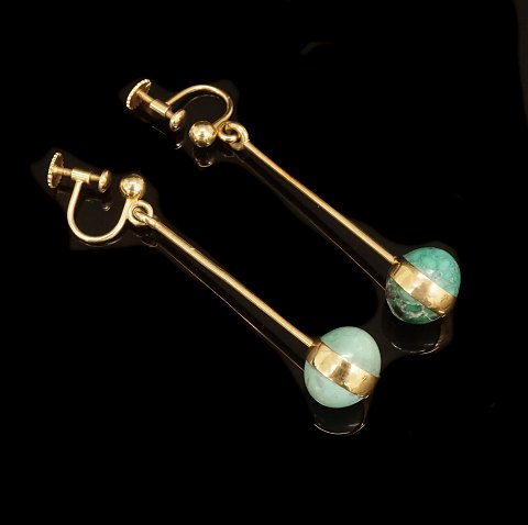 Georg Jensen, Denmark: A pair of 18kt gold 
earrings. #1140. L: 5cm