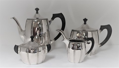 Wilhelm Binder. Germany. Silver service (800). Consisting of ; coffee pot, 
teapot, cream jug and sugar bowl.