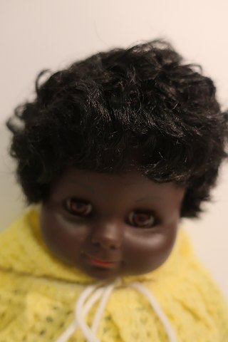Puppe Dunkel
Mit schwarzem Haar und schöne dunkelfarbigen Augen