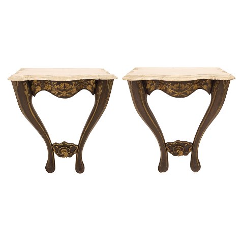 Pair of partly gilt Rococostyle console table with 
imitated marble wooden tops. Denmark circa 1850. 
H: 77cm. Top: 70x48cm