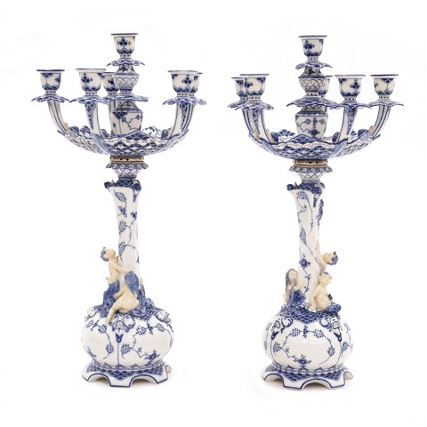 Pair of Royal Copenhagen blue fluted full lace 
porcelain candelabra. #1006. Circa 1920. H: 57cm. 
D: 28cm