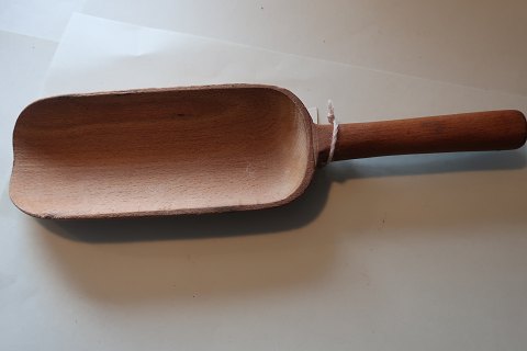Ein altes Löffel aus Holz für das alte Gemichtwarengeschäft