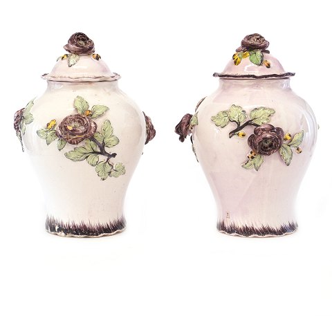 Pair of polychrome decorated lidded faience vases. 
Rörstrand, Sweden, circa 1770. H: 34cm