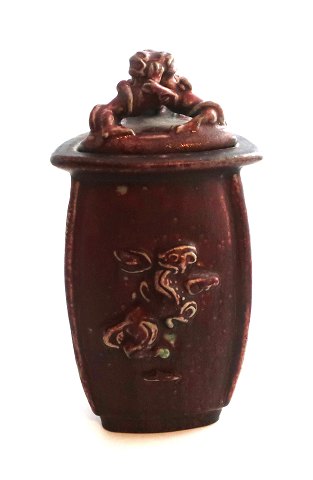 Royal Copenhagen. Bode Willumsen. Triangular vase with lid in oxblood glaze. 
Model 20160. Height 20 cm.