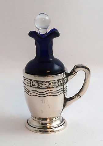 Danish work. Small oil bottle with silver cup. Height 11.5 cm. Produced 1918