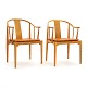 Hans J. Wegner: A pair of Chinachairs. Very nice patinated cherrywood. Produced 
by Fritz Hansen