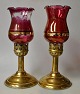 Pegasus – Kunst - Antik - Design präsentiert: Ein Paar Hurrikane aus Messing mit rotem Glas, ca. Um 1900. ...