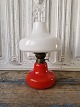 Karstens Antik 
presents: 
Holmegaard 
Oline lamp in 
red glass with 
a shell sleeve 
in opal glass