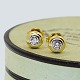 Antik 
Damgaard-
Lauritsen 
presents: 
Earrings 
of 18k gold and 
white gold set 
with diamonds