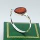 N. E. From; Bangle of sterling silver with amber