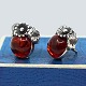 N. E. From; A pair of amber ear rings set in sterling silver