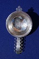 Cohr tea strainer of Danish sterling silver