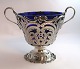 Lundin Antique 
presents: 
Michelsen. 
Silver bowl 
with blue glass 
insert (830). 
Height 15 cm. 
Produced 1915.