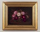 L'Art presents: 
Danish 
painter.
Oil on canvas.
Roses in 
basket.