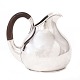 Aabenraa 
Antikvitetshandel 
präsentiert: 
Silberkanne 
von Theodor 
Sabroe, 
Kopenhagen, 
1938. H: 14cm