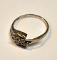 Ring aus 14 
Karat Weißgold, 
20. 
Jahrhundert, 
mit 6 ...