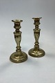 Danam Antik 
presents: 
Antique 
pair of tall 
Candlesticks in 
Brass