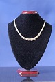 Necklace in 14 
carat gold, 
brick in 5 
rows, with a 
...