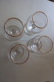 ViKaLi 
präsentiert: 
Schwenker/Schwenkglas 
(Kognacglas) 
goldgerändert
H: 9cm
Aus den 
1950-Jahren
Wir haben: 4 
...