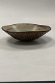Danam Antik 
præsenterer: 
Royal 
Copenhagen 
Stentøjsskål af 
Axel Salto No. 
20727