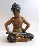Lundin Antique 
præsenterer: 
Dahl 
Jensen. 
Porcelænsfigur. 
Javanesisk 
Krisfægter. 
Model # 1113. 
Højde 18 cm. (1 
...