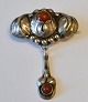 Dänische 
Jugendstilbrosche 
in Silber mit 
Bernstein, 20. 
...