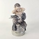 Kinnerup Antik 
& Porcelæn 
præsenterer: 
RC figur 
2113
Faun med krage
17 cm