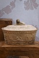 K&Co. presents: 
Antique 
Swedish oval 
empire faience 
tureen from 
1810-40 with 
fine 
decorations and 
a lion lying 
...