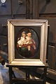 K&Co. presents: 
Decorative 
19th century 
oil painting 
painted on wood 
with a motif of 
2 children 
sitting on a 
...