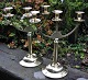 Pegasus – Kunst 
- Antik - 
Design 
presents: 
Pair of 
Danish Jugend 
three-armed 
candlesticks in 
brass, circa 
1900.