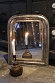 K&Co. presents: 
French 
19th century 
Louis Philippe 
silver mantel 
mirror.
H: 51cm. W: 
42cm.
