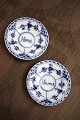 K&Co. presents: 2 pieces of old Blue Fluted Half Lace small plates from Royal Copenhagen, dated and stamped 1942...