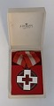 Lundin Antique präsentiert: Dänische Rotkreuzmedaille 1939–1945. In Originalverpackung. Durchmesser 4 cm.