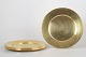 Set of six brass charger plates, 1970s.