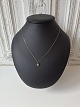 Necklace and pendant in 9 kt gold adorned with a brilliant