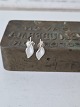 Leaf-shaped earrings in sterling silver