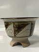 Ceramic bowl on foot, with brown shades.Measures H ...
