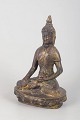 Gilt bronze Buddha figure.