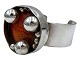 Jacob HullBangle with large orange center from 1960-1970