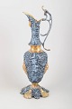 Baroque style bronze wine pitcher.