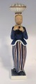 Lundin Antique präsentiert: Royal Copenhagen. Porzellanfigur. Die Frau mit den Eiern. Modell 4844. Höhe 31 cm. ...