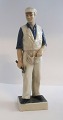 Lundin Antique präsentiert: Königliches Kopenhagen. Tischler. Modell 4535. Höhe 23 cm. (1 Wahl)