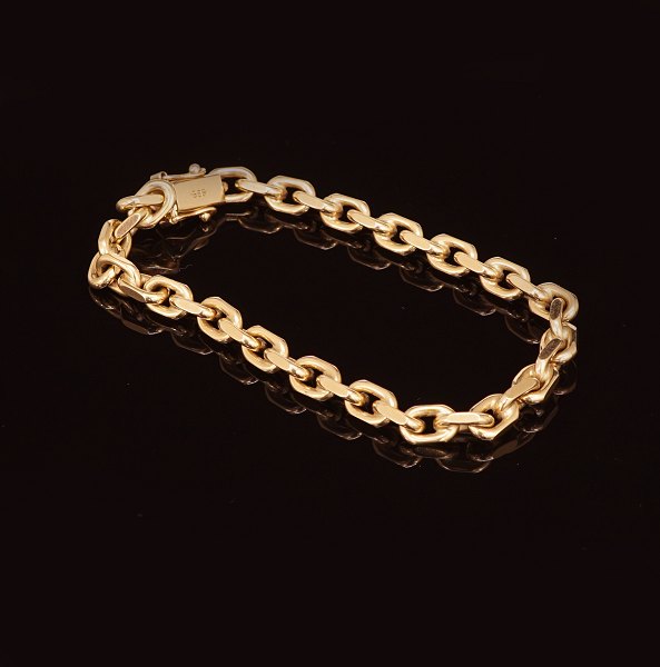 H. C. Kauffmann, København: Anker armbånd i 14kt guld med dobbelt sikkerhedslås. 
L: 19,5cm. V: 22gr