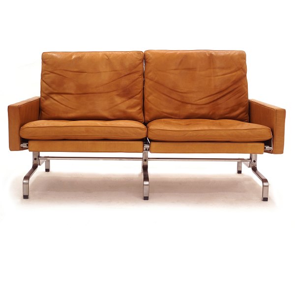 Poul Kjærholm PK31/2 sofa with patinated original brown leather. Manufactured by 
Fritz Hansen, Denmark. H: 70cm. L: 137cm. D: 76cm